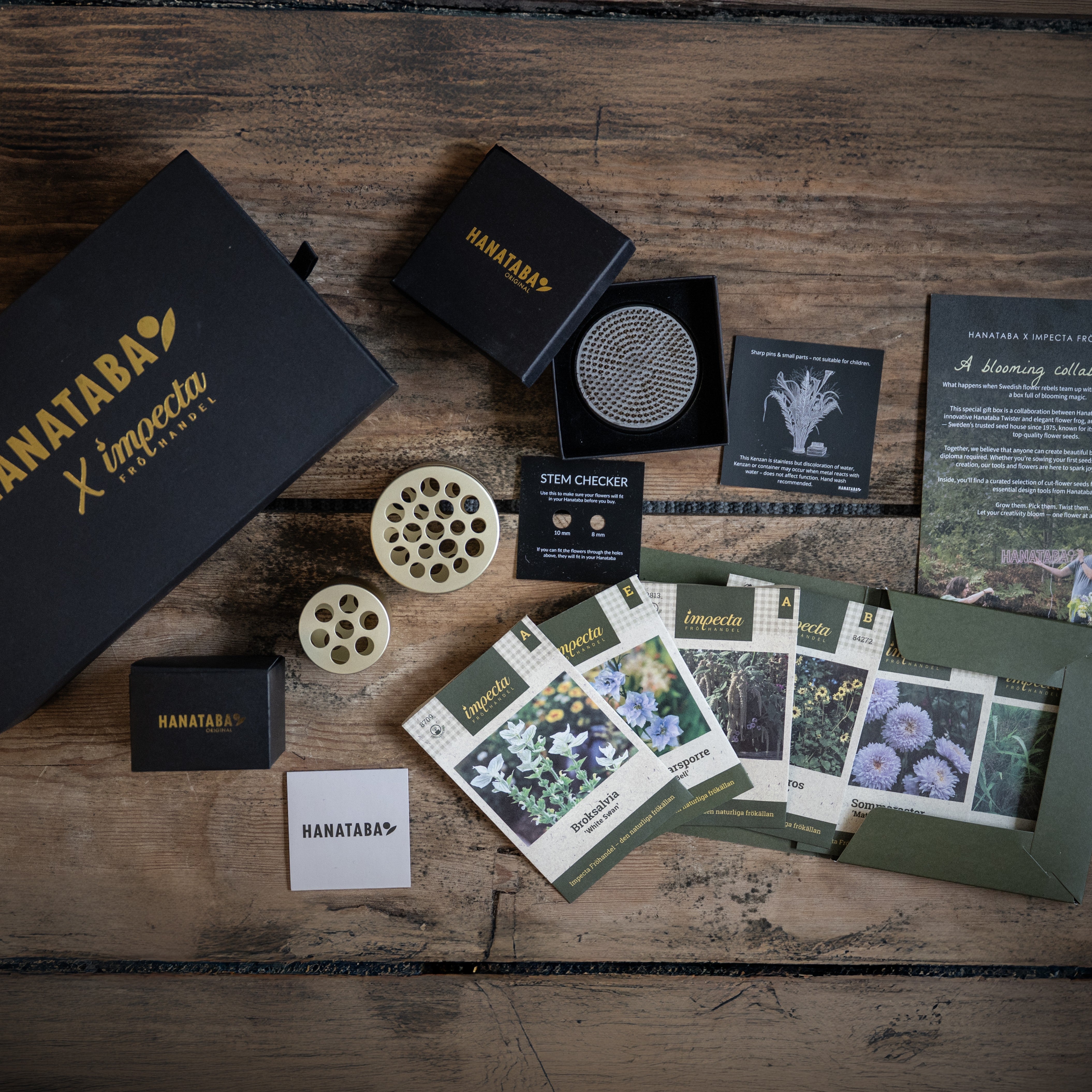 Collection of Hanataba and Impecta Fröhandel seeds and products on a wooden surface