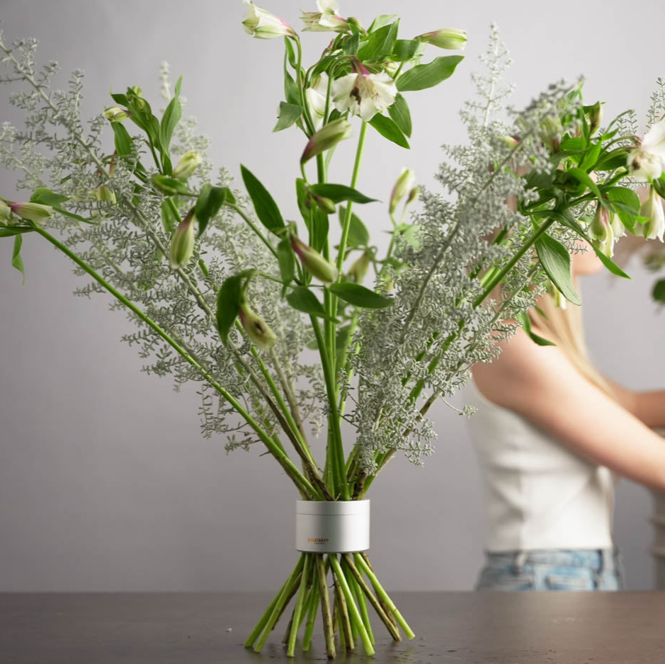 Hanataba-Pearly-silver-bouquet-twister-standing-on-a-table