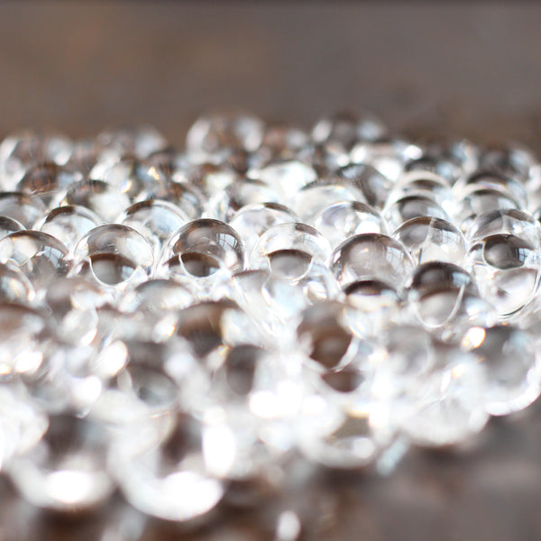 Close-up of Hanataba water bubbles, used for stabilizing and hydrating floral arrangements.