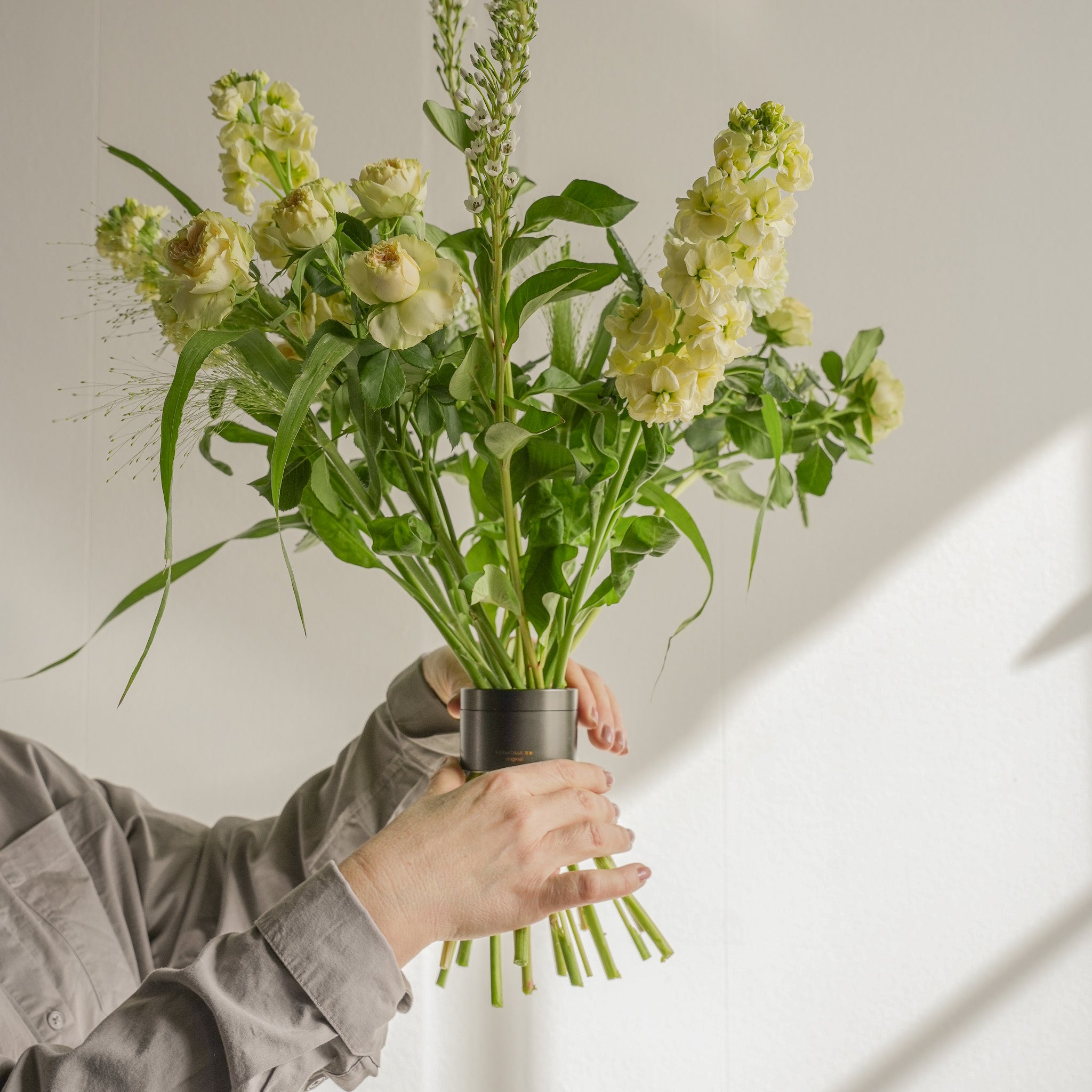 Close-up of the Bouquet Twister demonstrating its functionality in floral arranging